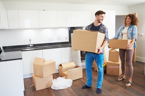 Packed moving boxes in a new home after house removals in Addiscombe